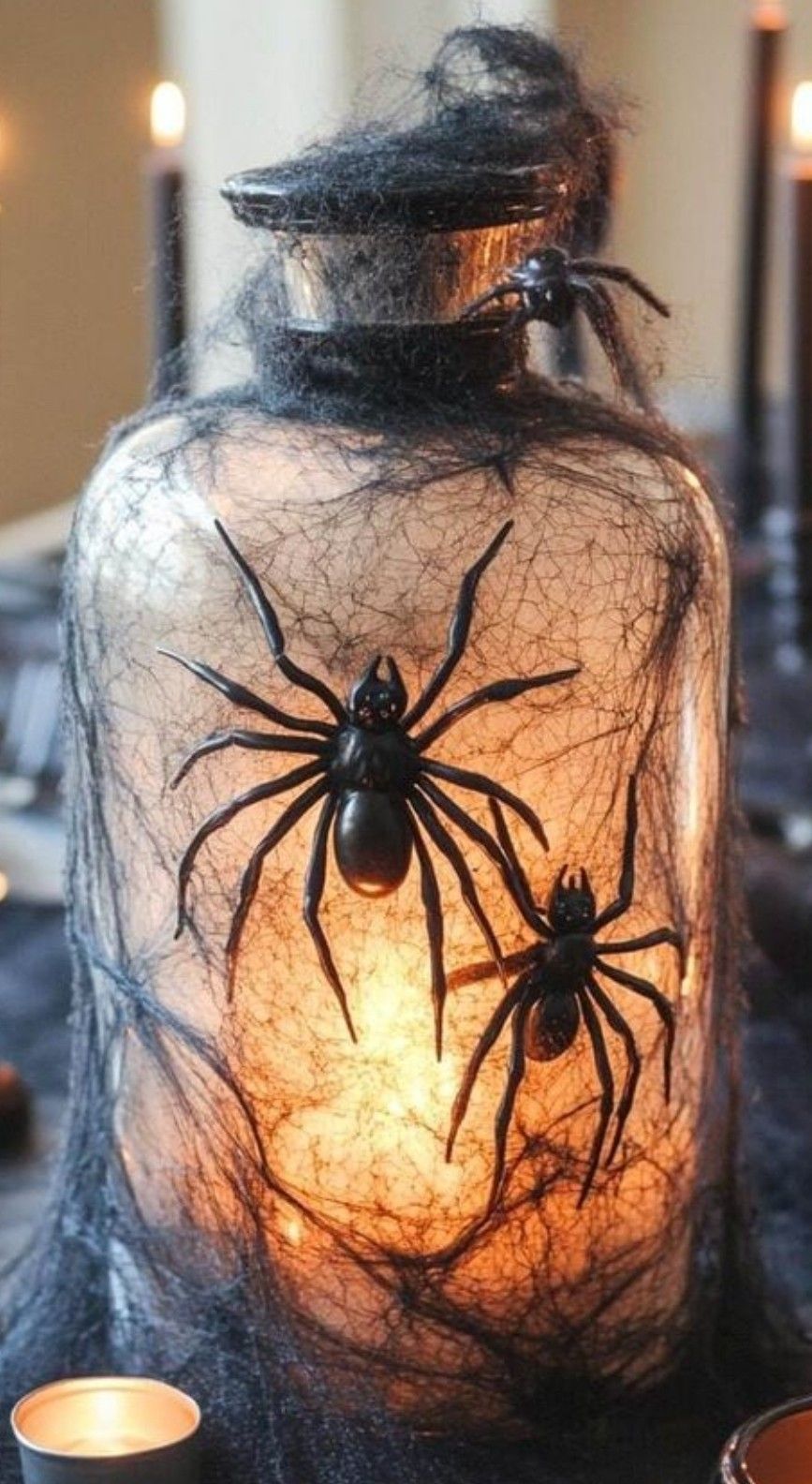 10 Scary Halloween Decor Ideas for an Affordable Vintage-Inspired Haunted Home - 4. Set a Scary Halloween Party Table with Thrifted Tableware 1